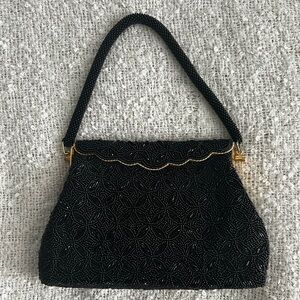 Vintage 1950s black hand-beaded clutch purse